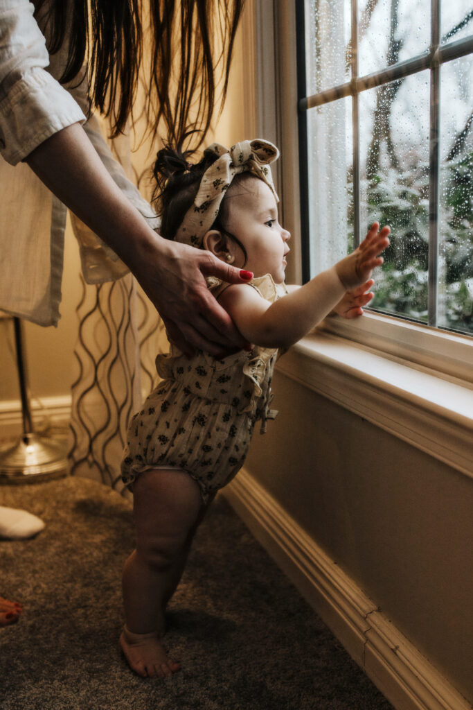 baby looking out of the window in randolph nj